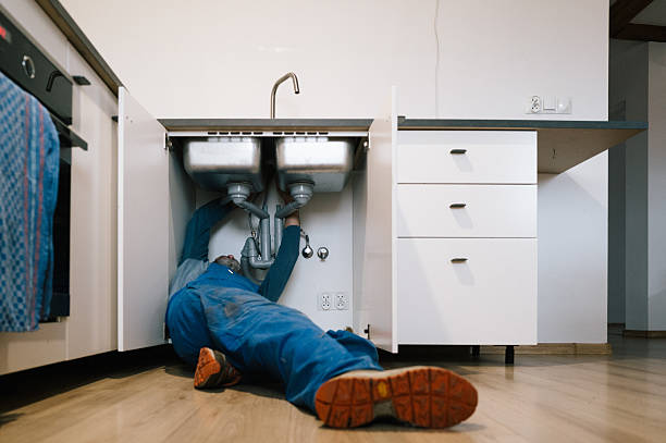 Professional Plumbing technician working in Newington, CT